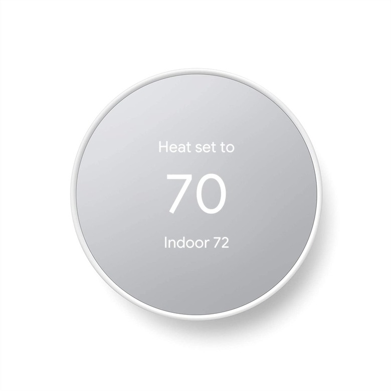 A Google Nest thermostat, which is a smart thermostat