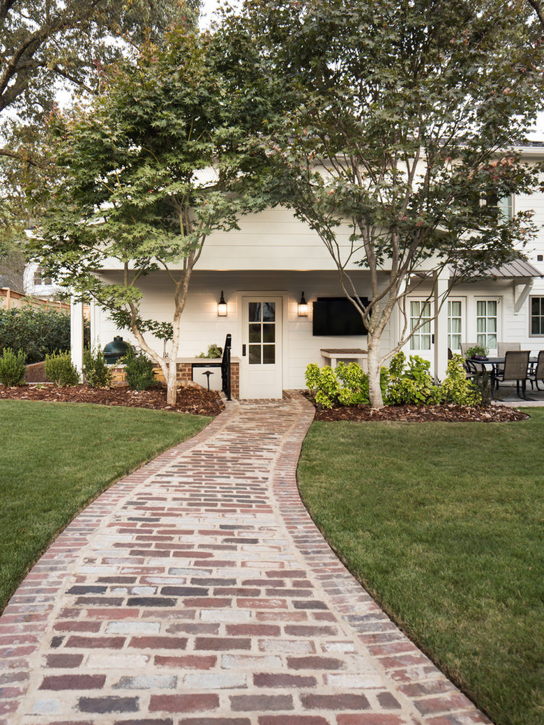 exterior door trim on modern white home with white door and window trims