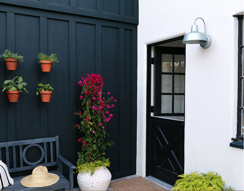 black exterior Dutch door, black and white walls