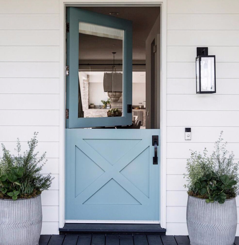 robin's egg blue exterior Dutch door with single paned window