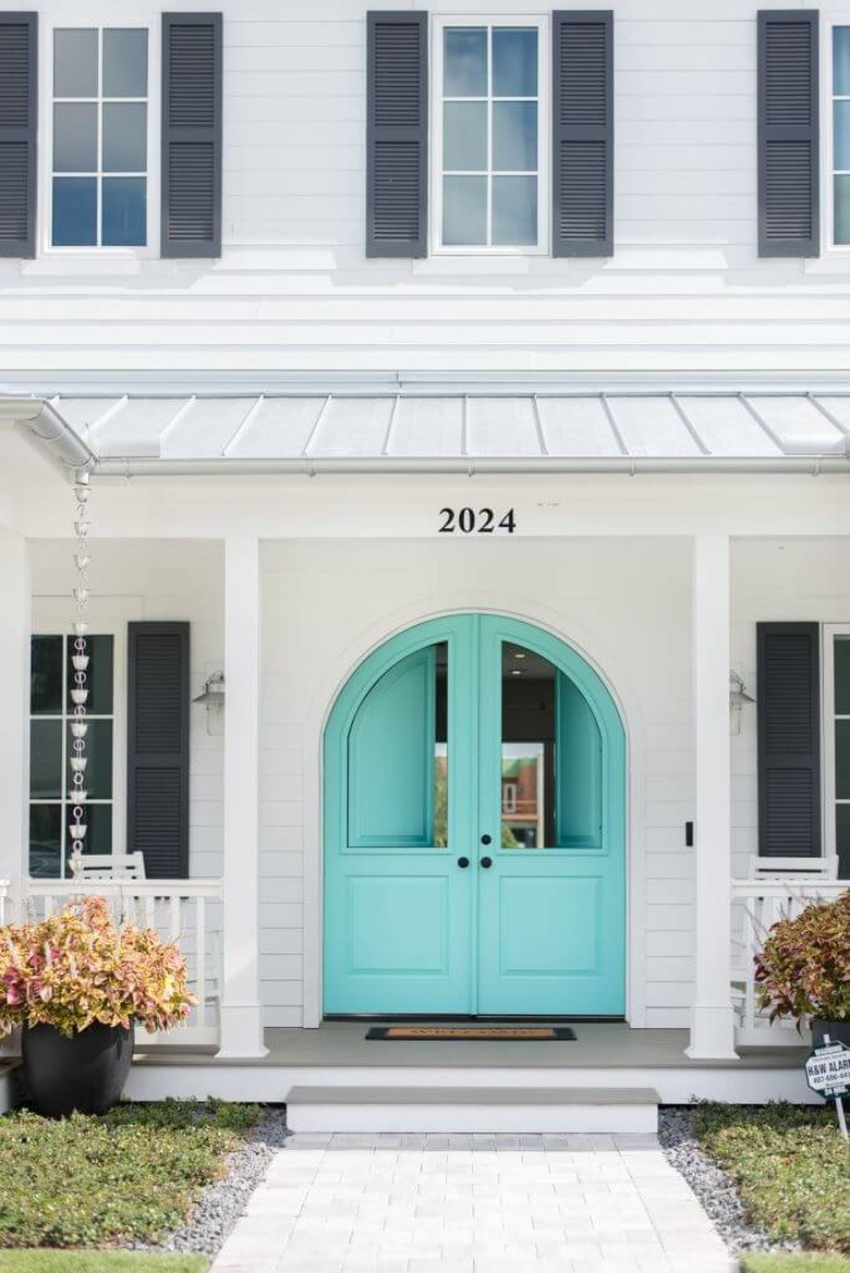 turquoise double exterior Dutch door, traditional white home