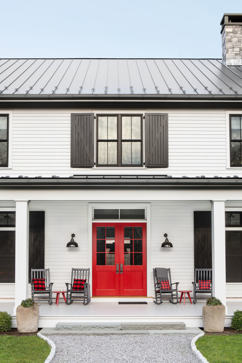 traditional monochrome exterior home styles with red door and gray shutters