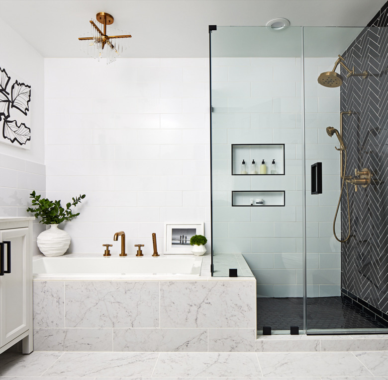 Black tiling in a shower-tub combo