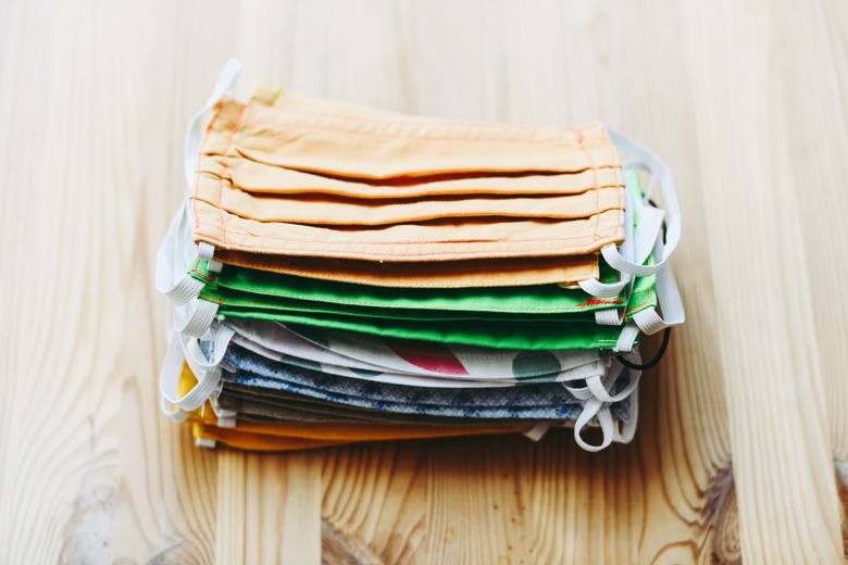 stack of  masks on wood surface