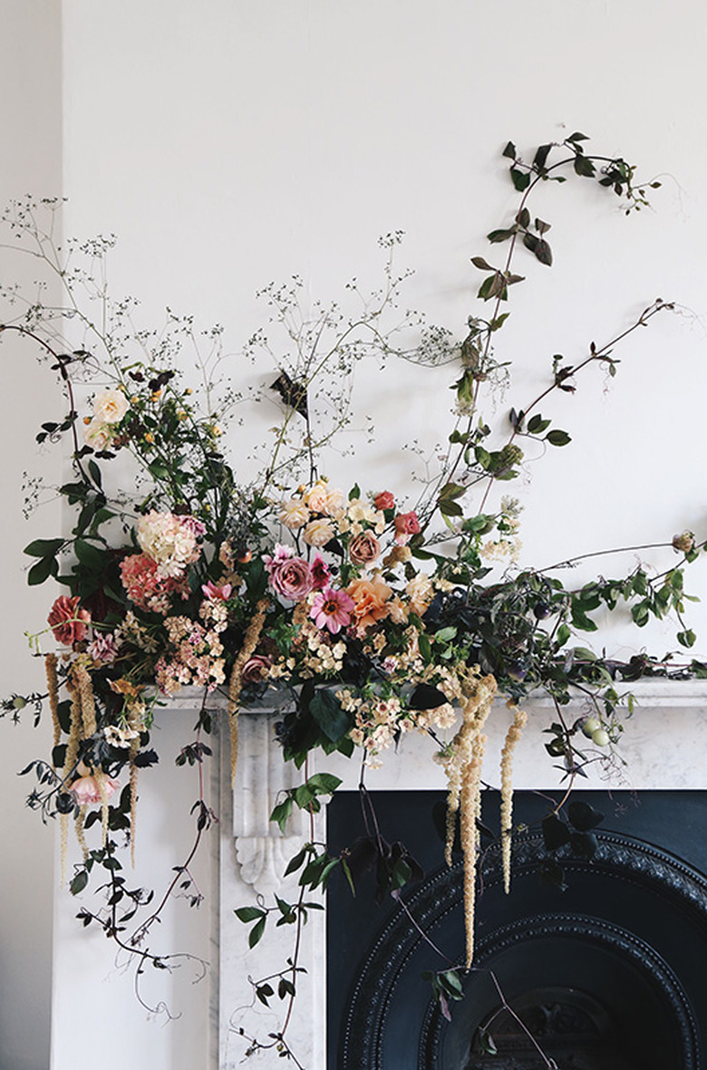 romantic fall flower arrangement on the mantel