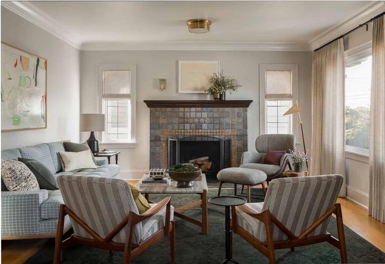 soft gray family room paint colors with white ceiling and patterned chairs