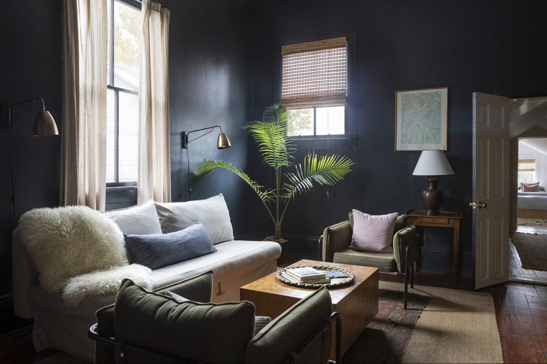 dark blue family room with linen family room window treatments