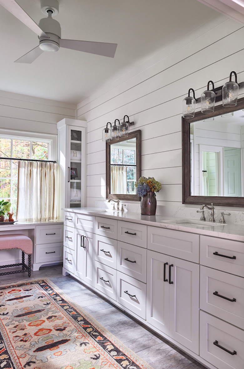 Farmhouse bathroom storage by Maggie Griffin Design with storage