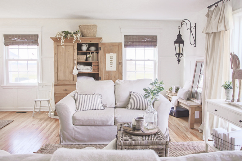 farmhouse-style living room with canvas/linen curtains