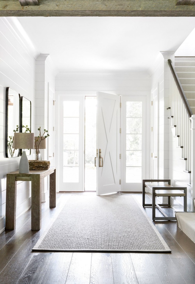 minimal farmhouse entryway with console and bench