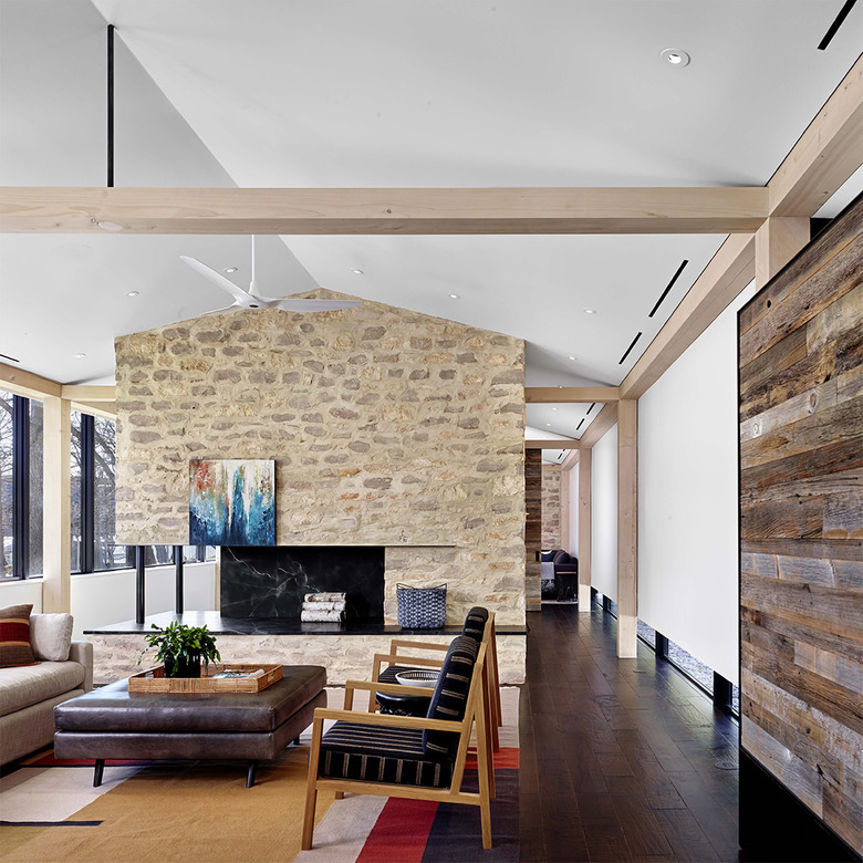 stone fireplace with artwork above