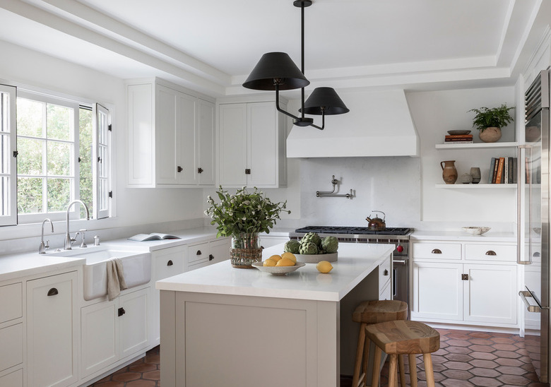 farmhouse flooring idea in neutral kitchen with terra cotta floors