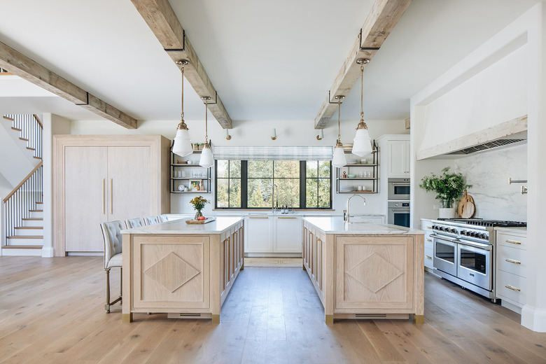 double island kitchen with farmhouse flooring idea