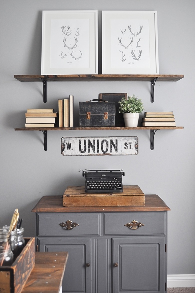 Farmhouse home office with vintage cabinet and rustic open shelving