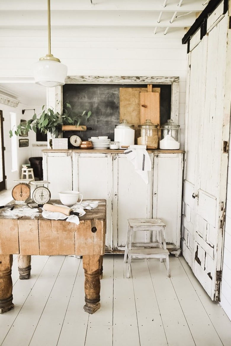 White painted wood farmhouse kitchen floor