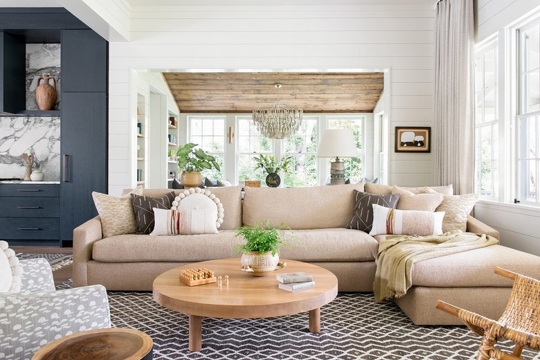 living room with large tan sectional