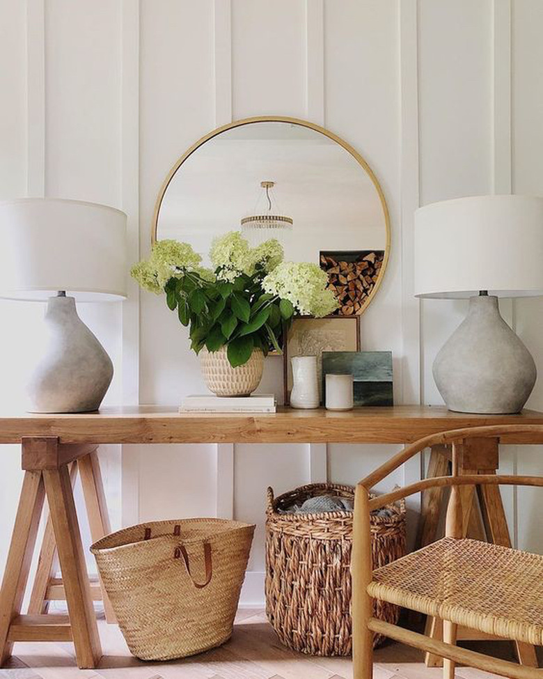 farmhouse living room lighting idea with table lamps on console rustic console table