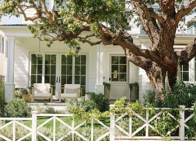 white porch with loungy club chairs