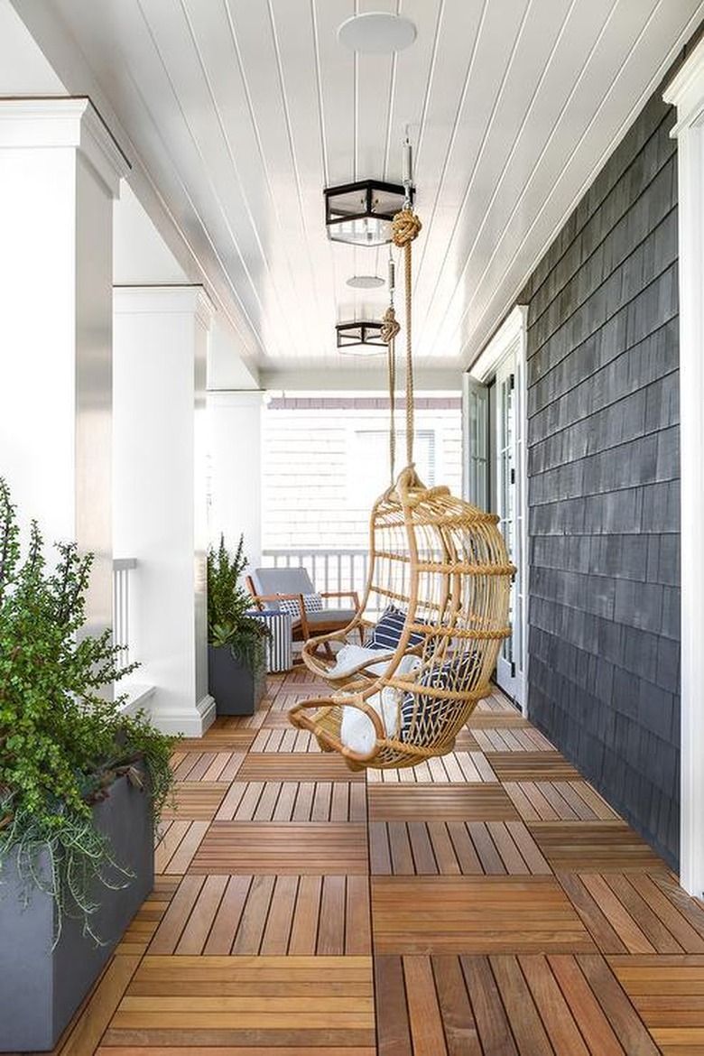 gray shingled home with wood floor