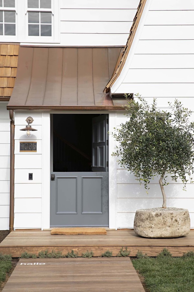 white farmhouse with Dutch door