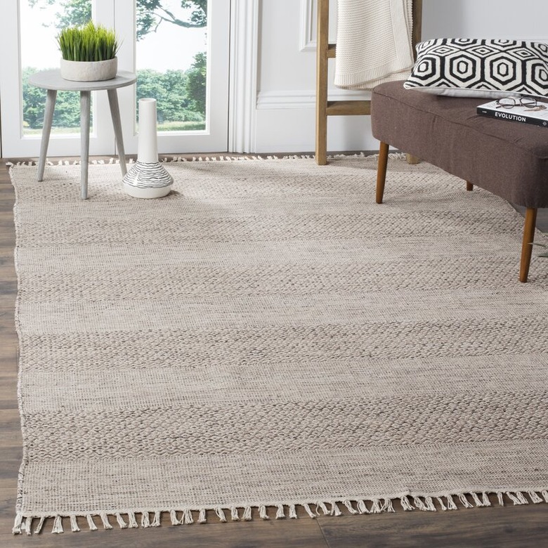 natural woven fringed carpet