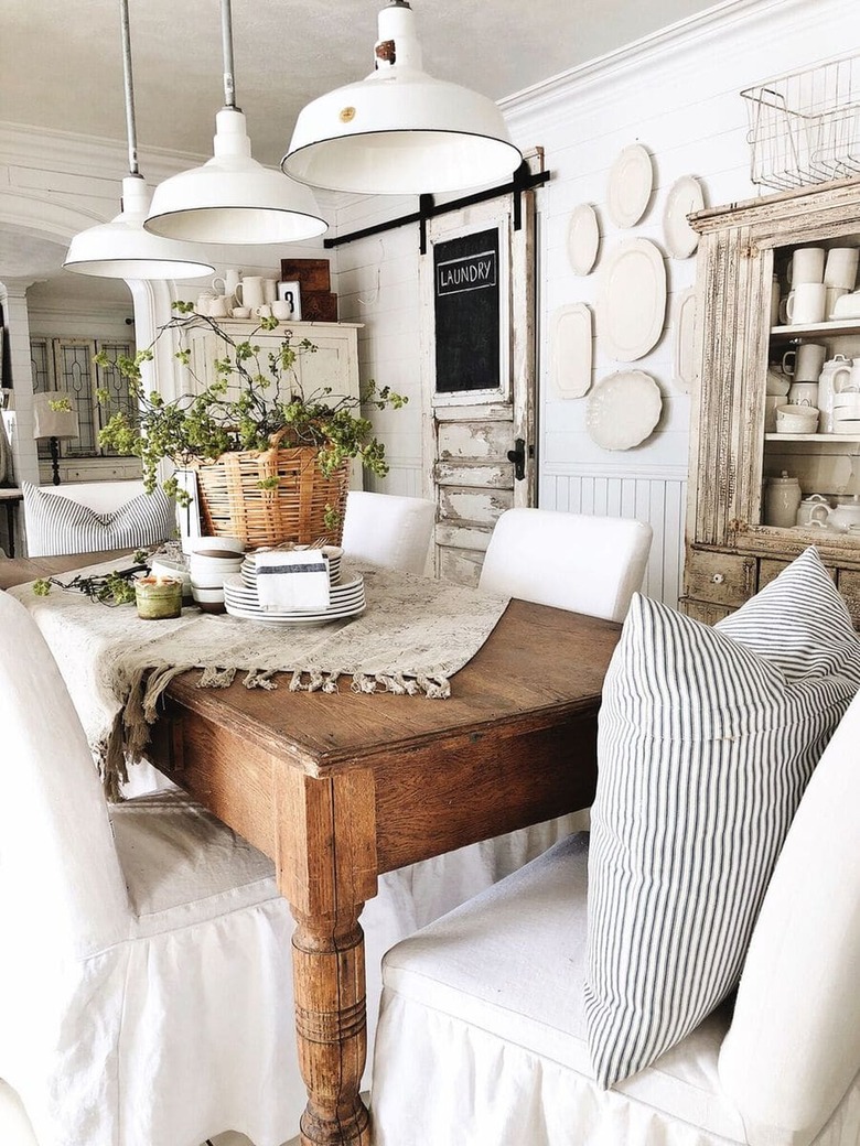 centerpiece in basket on wooden table