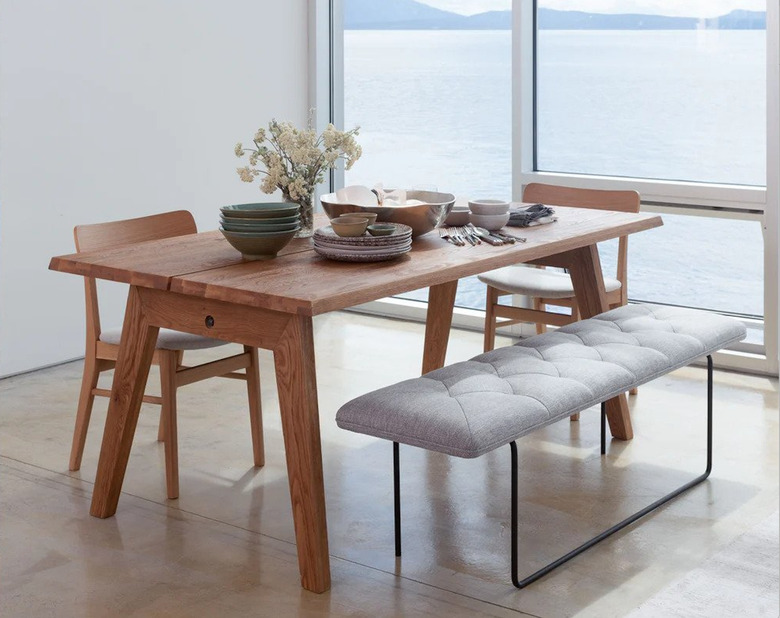 modern farmhouse table idea with chairs and a tufted bench