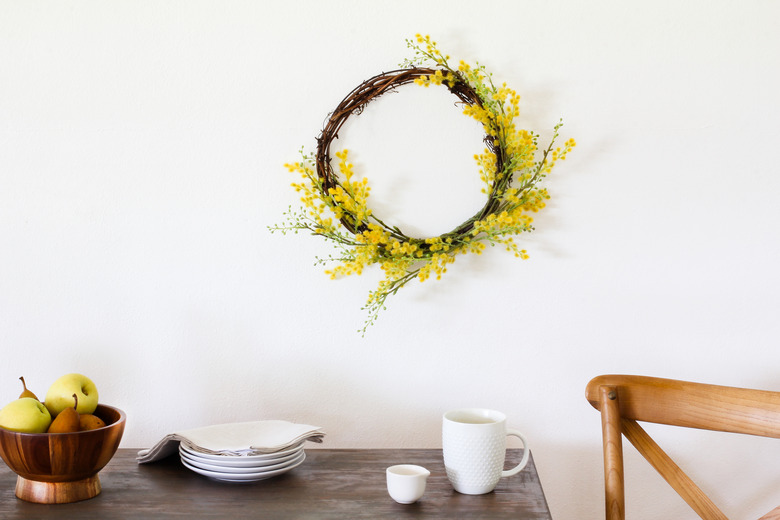 yellow wreath above table