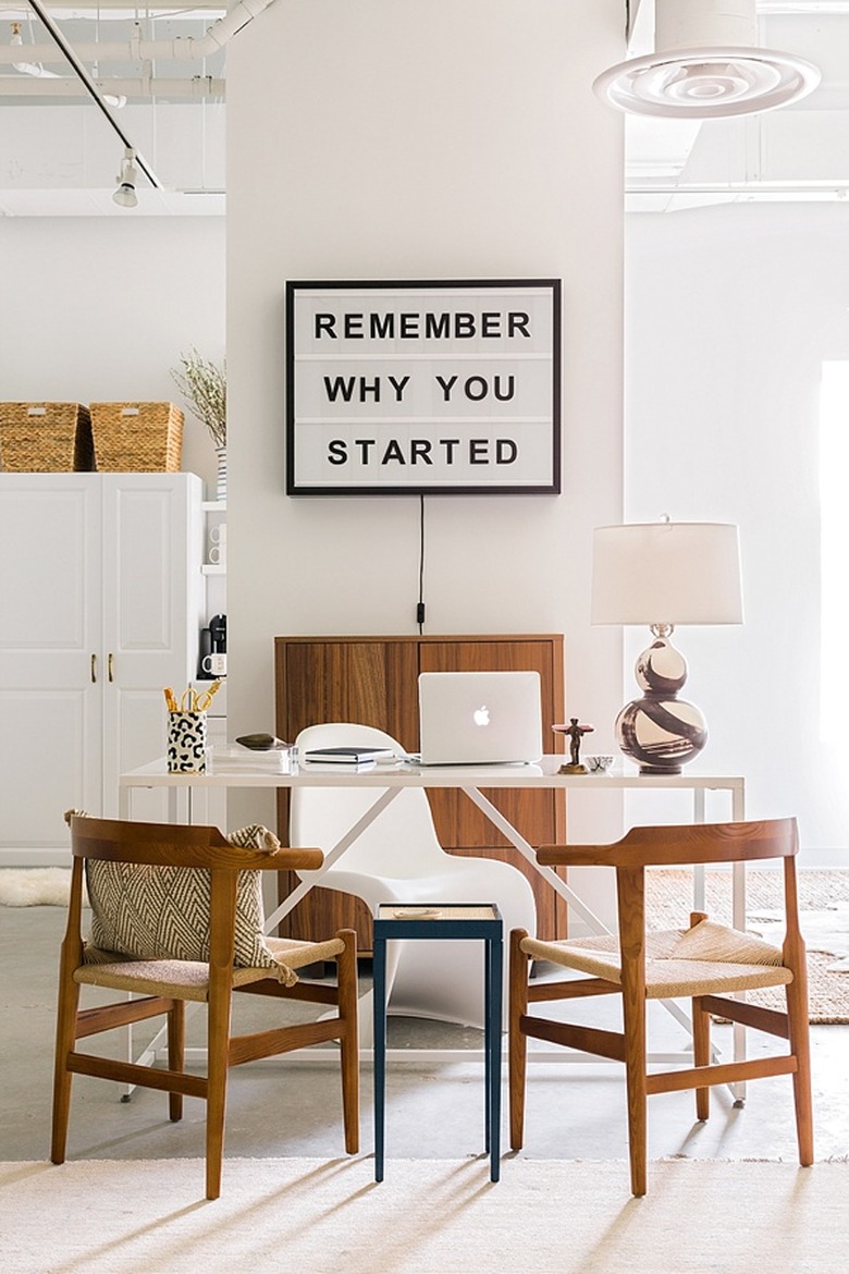 Feng Shui Home Office with white desk and wood chairs