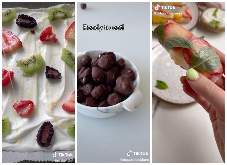 On the left is yogurt on a baking sheet topped with fruit. In the middle is chocolate-covered blueberries in a bowl. On the right is a hand holding a fruit spring roll.