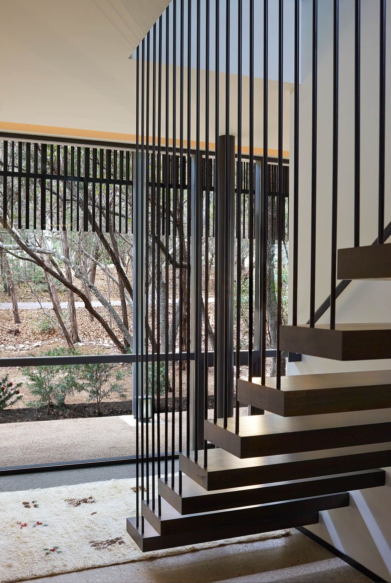 floating stairs with steel spindle rails