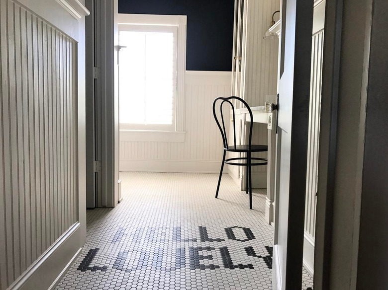 home corridor with word tile flooring