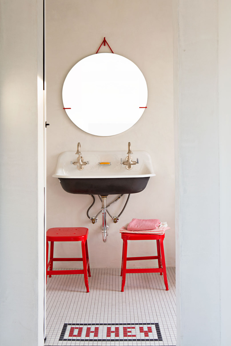 industrial style bathroom with mosaic tile floor