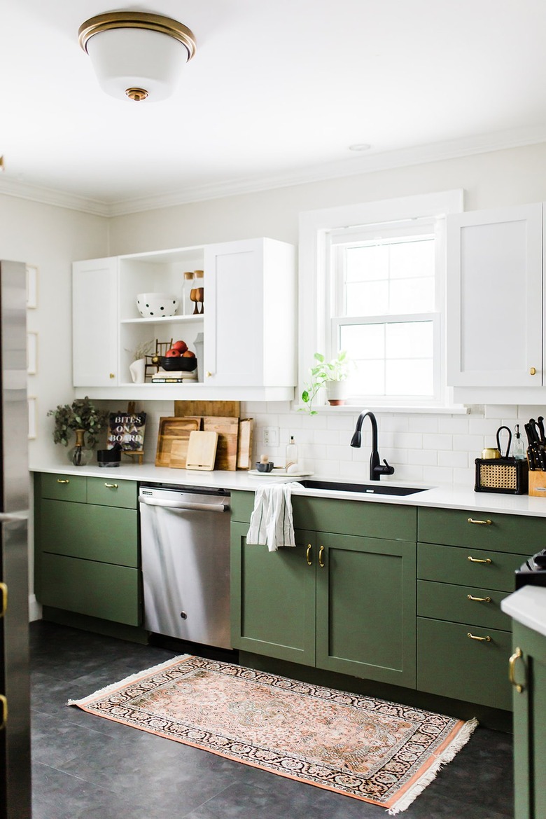 white and green kitchen with single flush mount light fixture