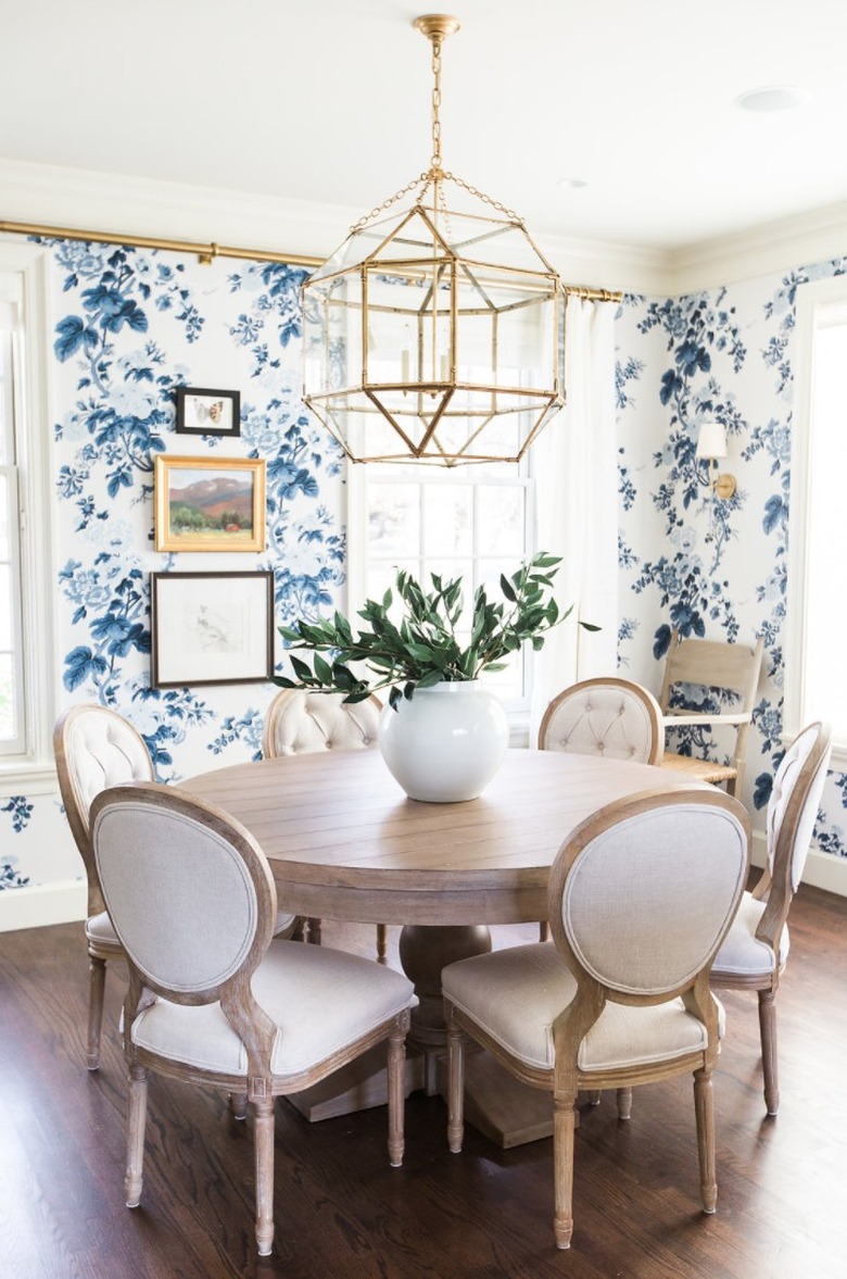 French Country Dining Room with Upholstered Chairs by Studio McGee