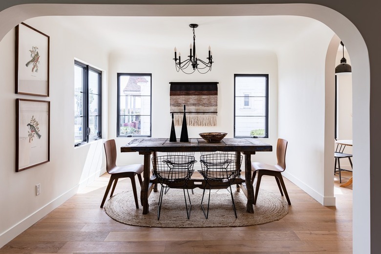 wood dining table with mixed chair styles