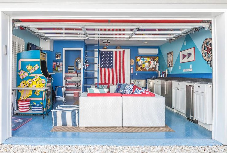 Converted garage bar ideas with kitchenette, bathroom and vintage arcade games