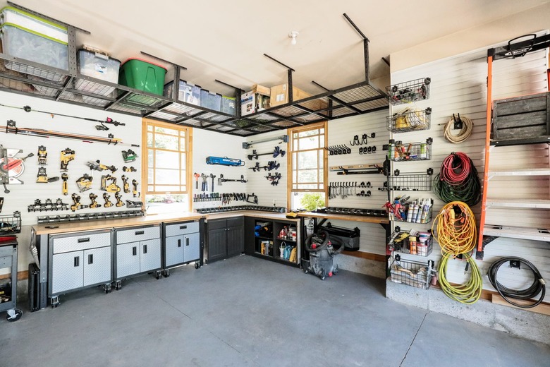 Organized garage shelving by Chris Loves Julia with Garage Wall Shelving Ideas