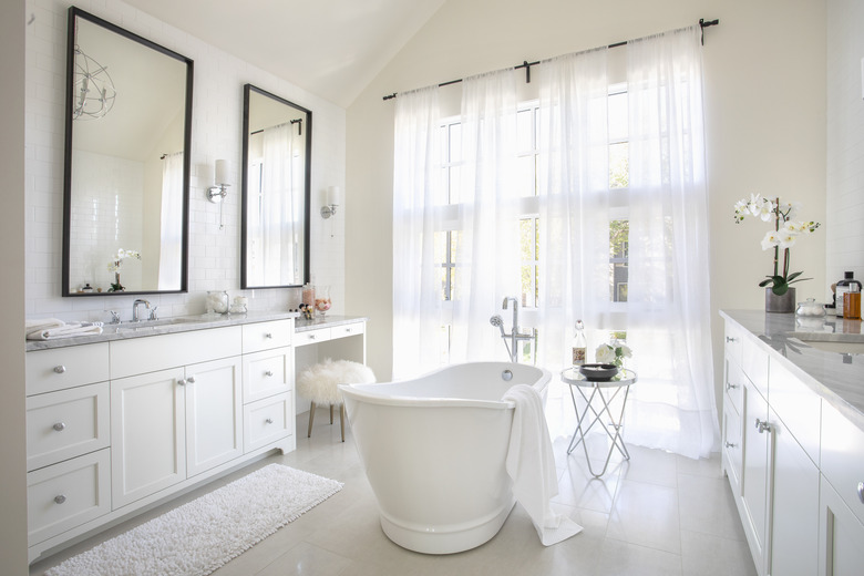 White home showcase interior bathroom with soaking tub