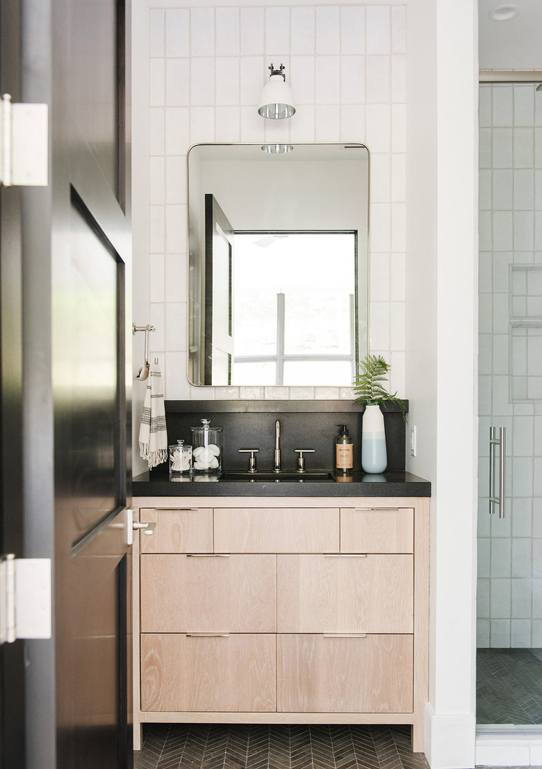 Bathroom backsplash idea with dark gray to match countertop