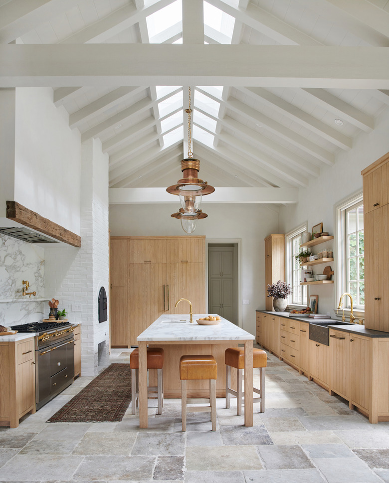 country farmhouse kitchen with natural stone flooring