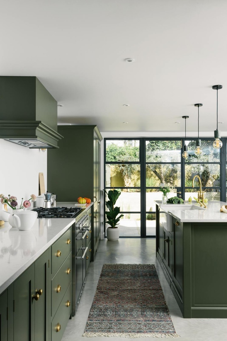 traditional kitchen with green cabinets