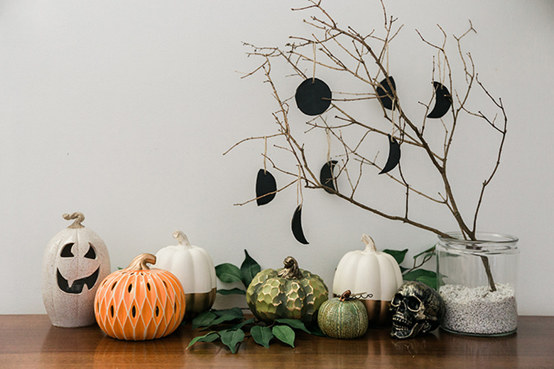 Make your own custom DIY air dry clay ornaments for Halloween.