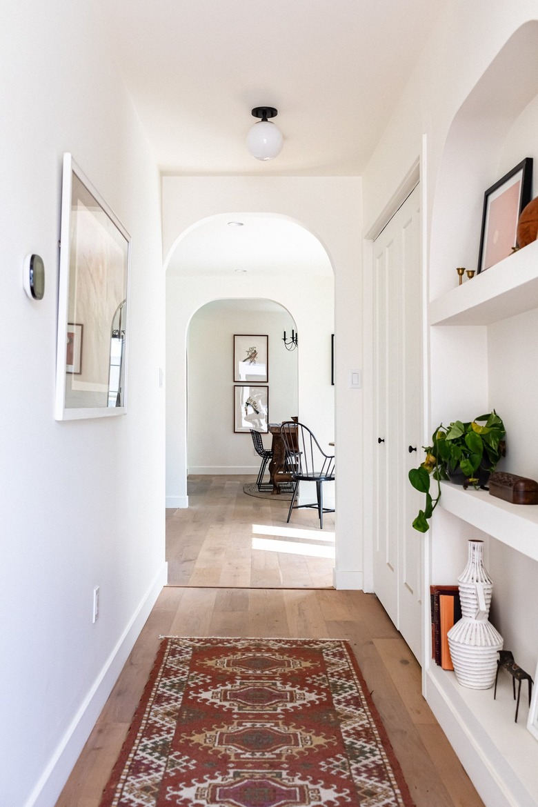 Hallway Furniture Ideas in white hall with rug