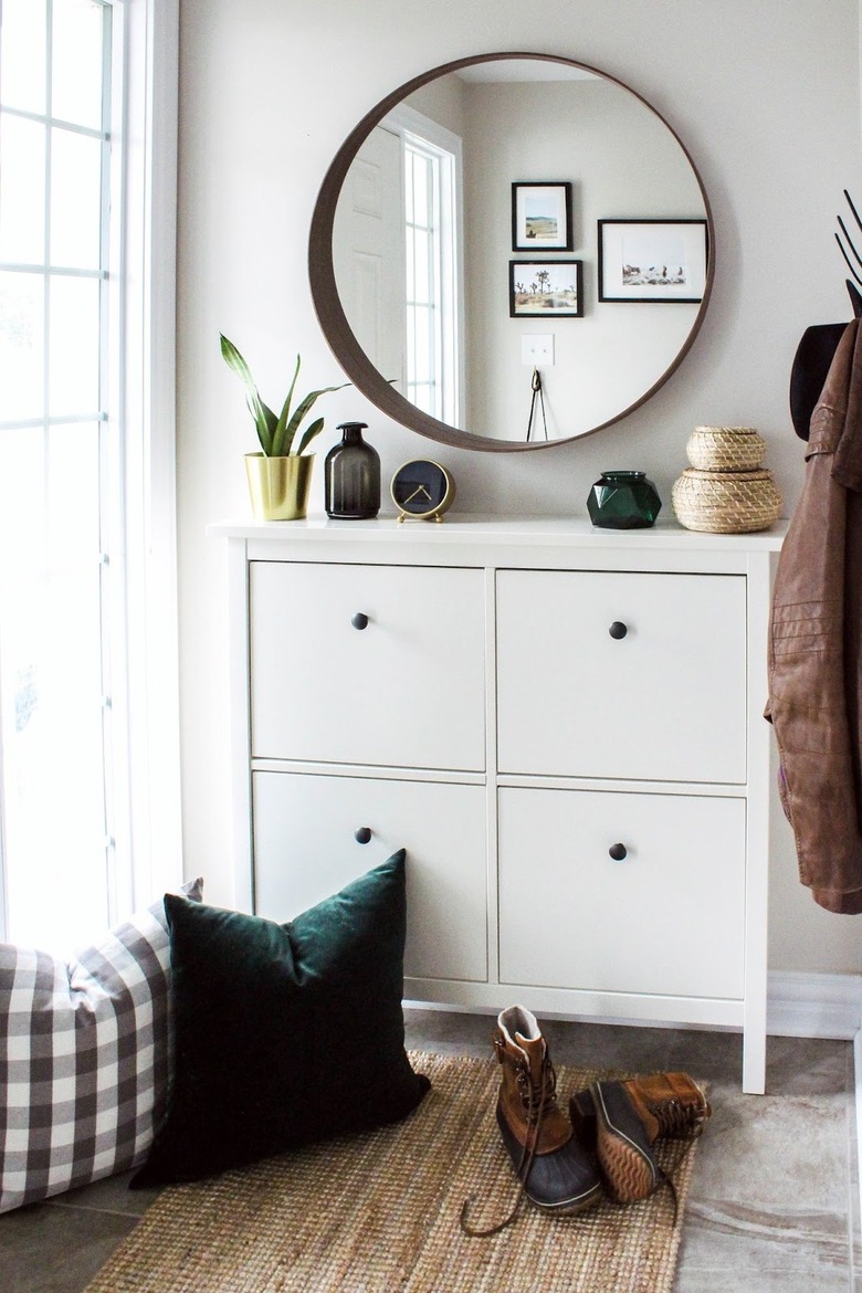 shoe cabinet and mirror in entryway