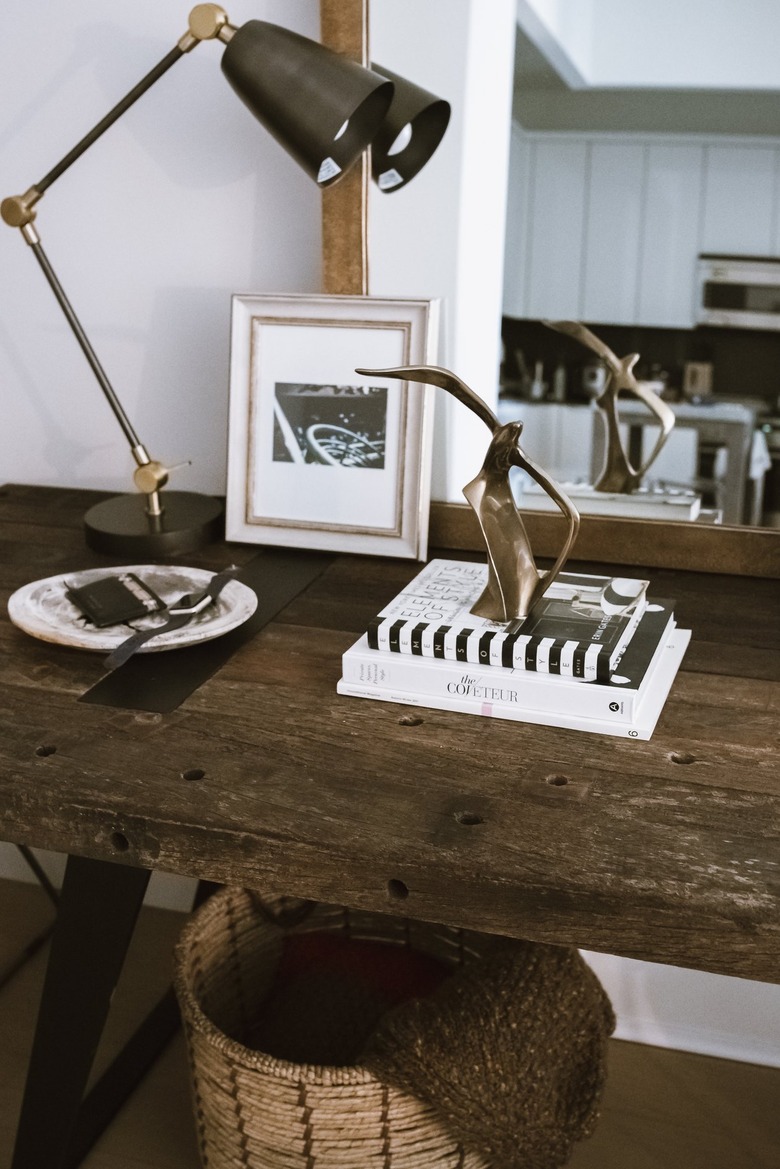 industrial table with tabletop decor in entryway