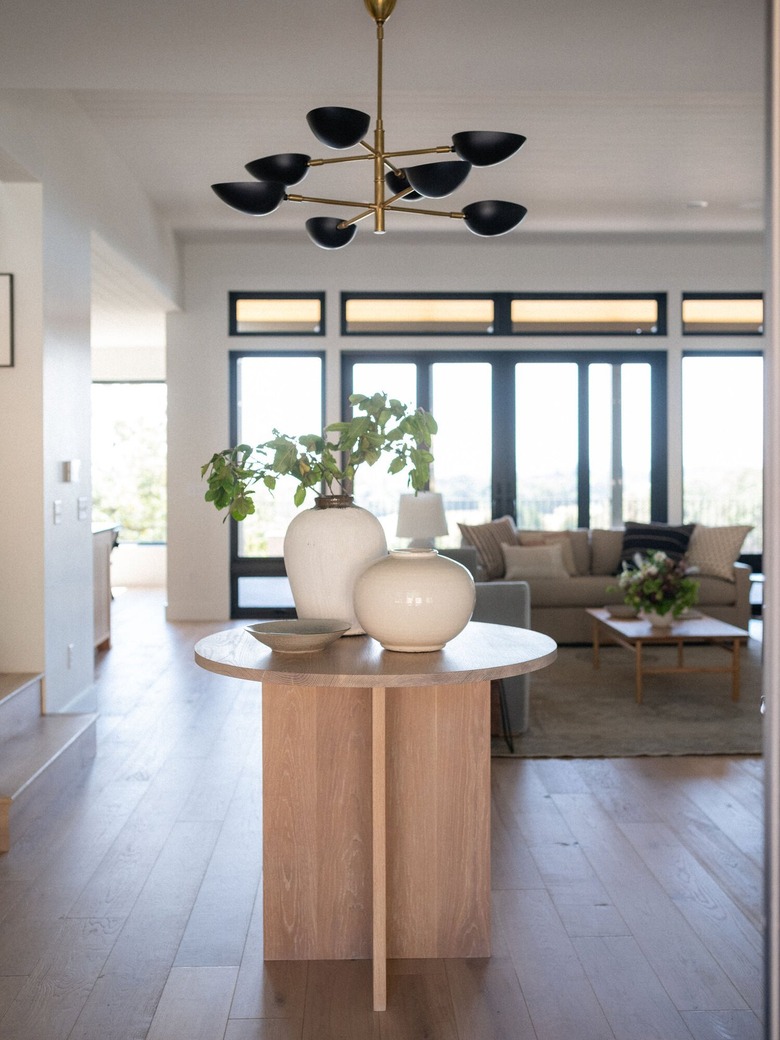 modern table and light fixture in entryway