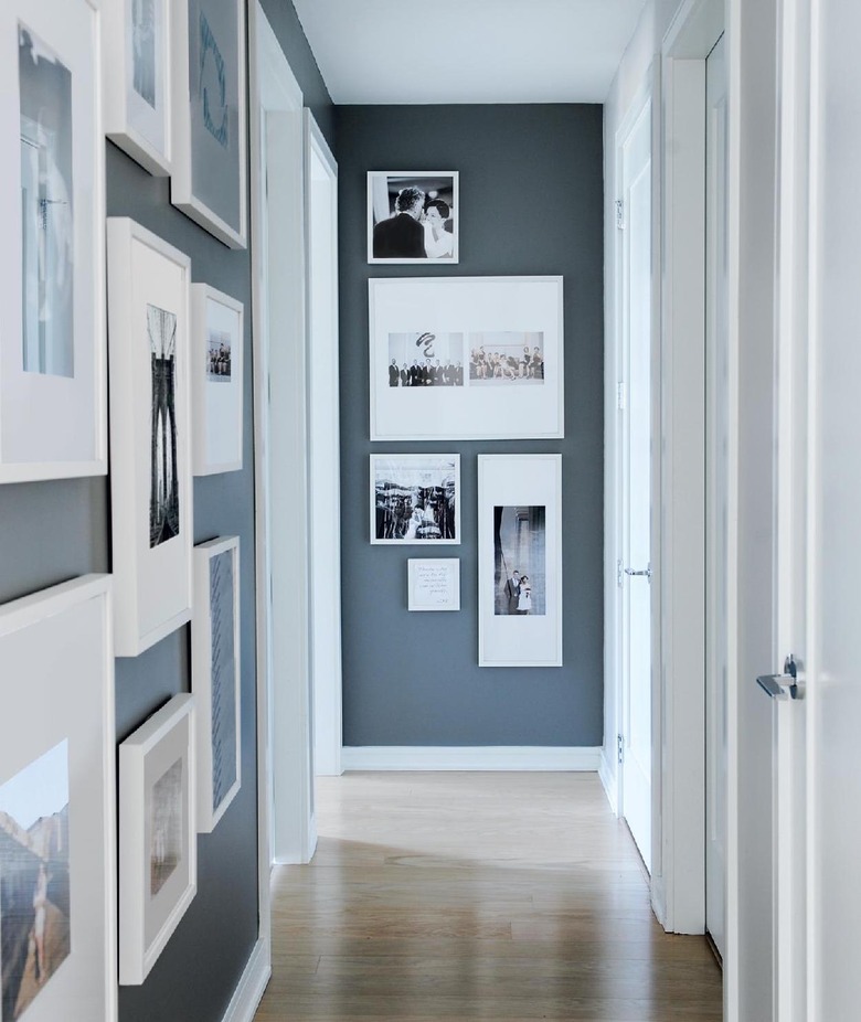 Hallway Gallery Wall Ideas with photos, art, prints, wood floors, paint.