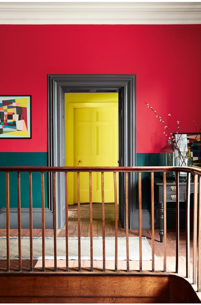 Walls painted with red, green, black, and yellow