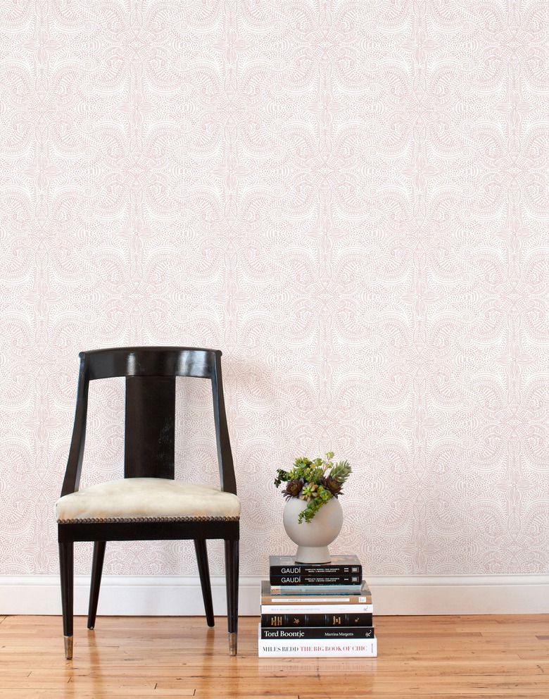 Hallway Wallpaper Ideas with blush pink wallpaper in hallway with retro chair